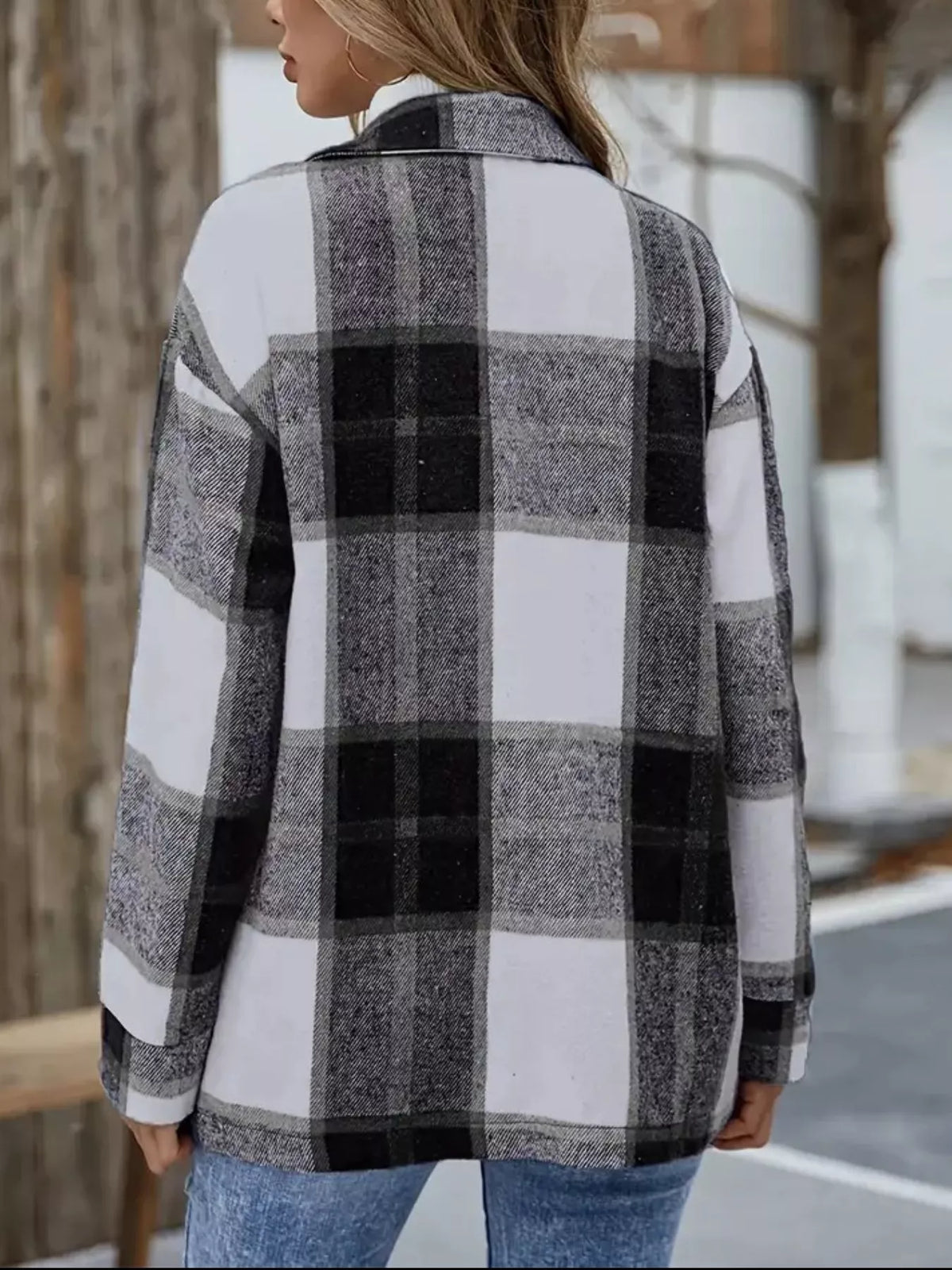 Back view of the black, gray and white plaid shacket.
