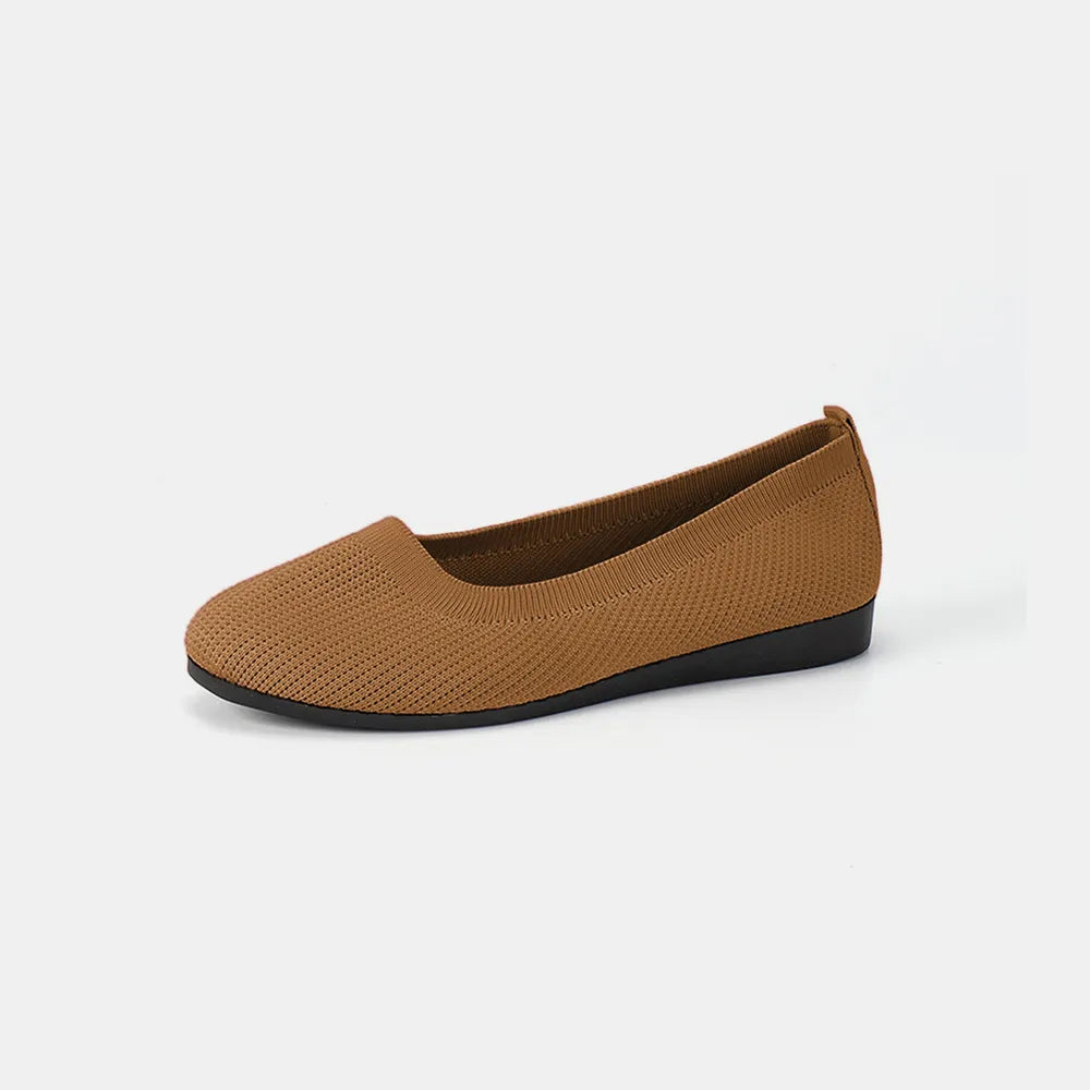 Caramel knit ballet flat shown from the side on a plain background.
