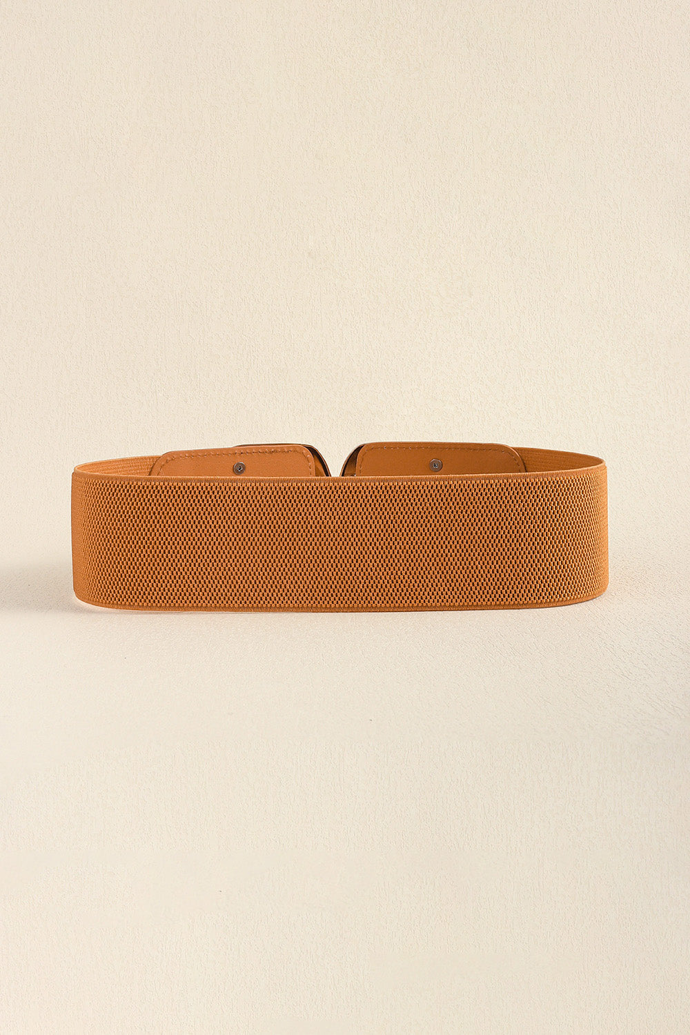 Back view of the caramel belt showing the wide elastic band.