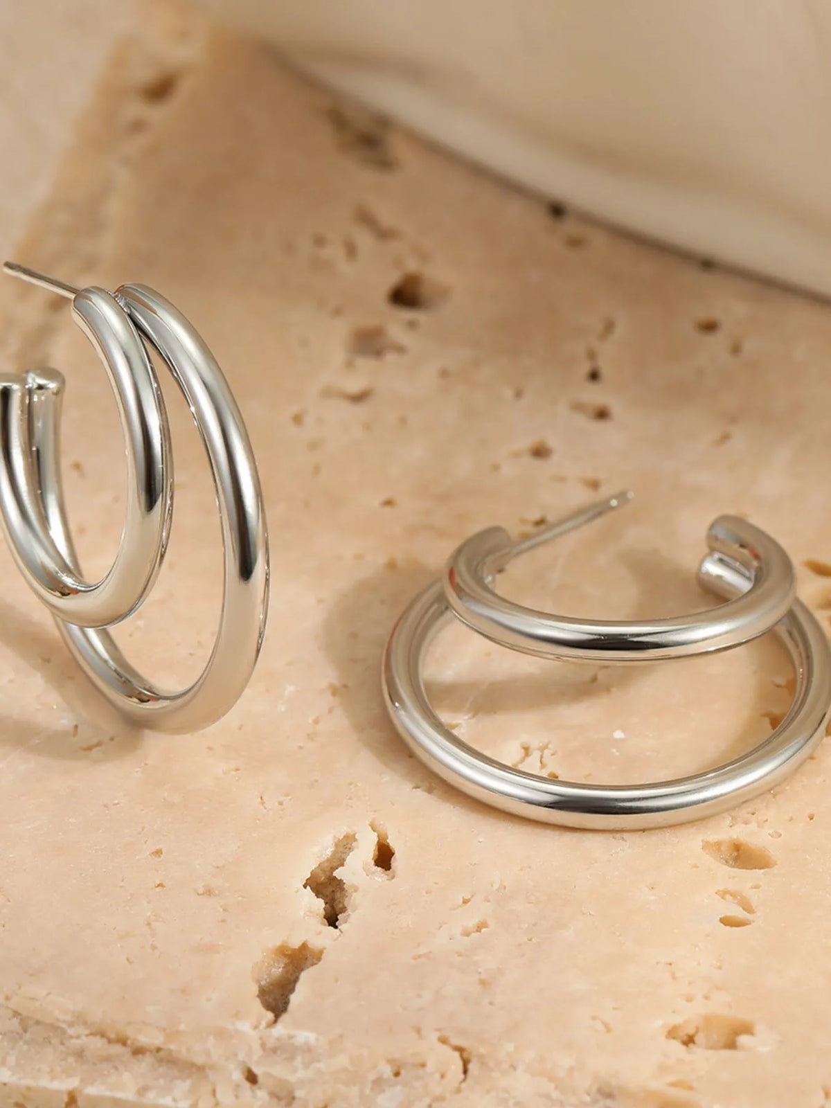 Chunky round hoop earrings, detail view