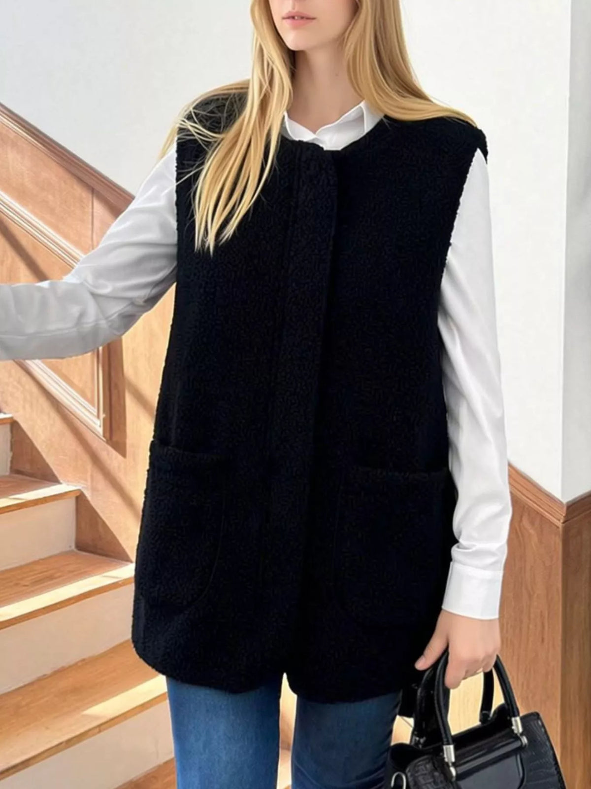 Black sherpa sleeveless vest with two patch pockets – Fashion Line 575.
